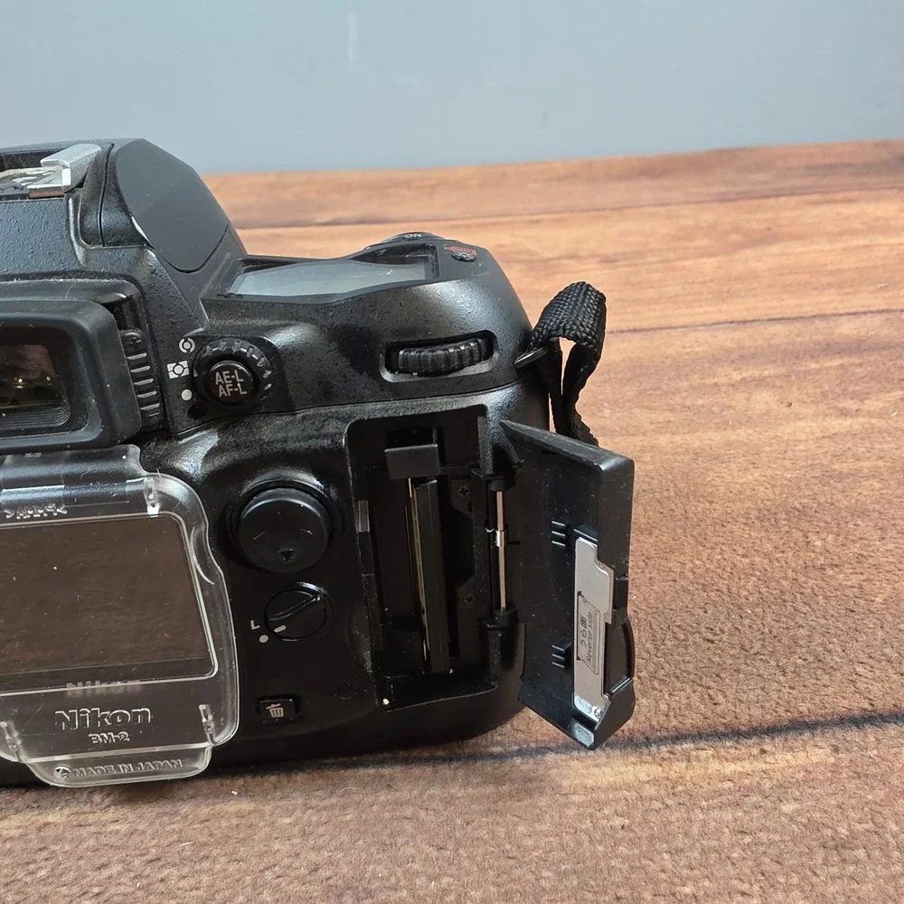 Nikon D100 Digital SLR Camera Body Black Fair For Parts Repair